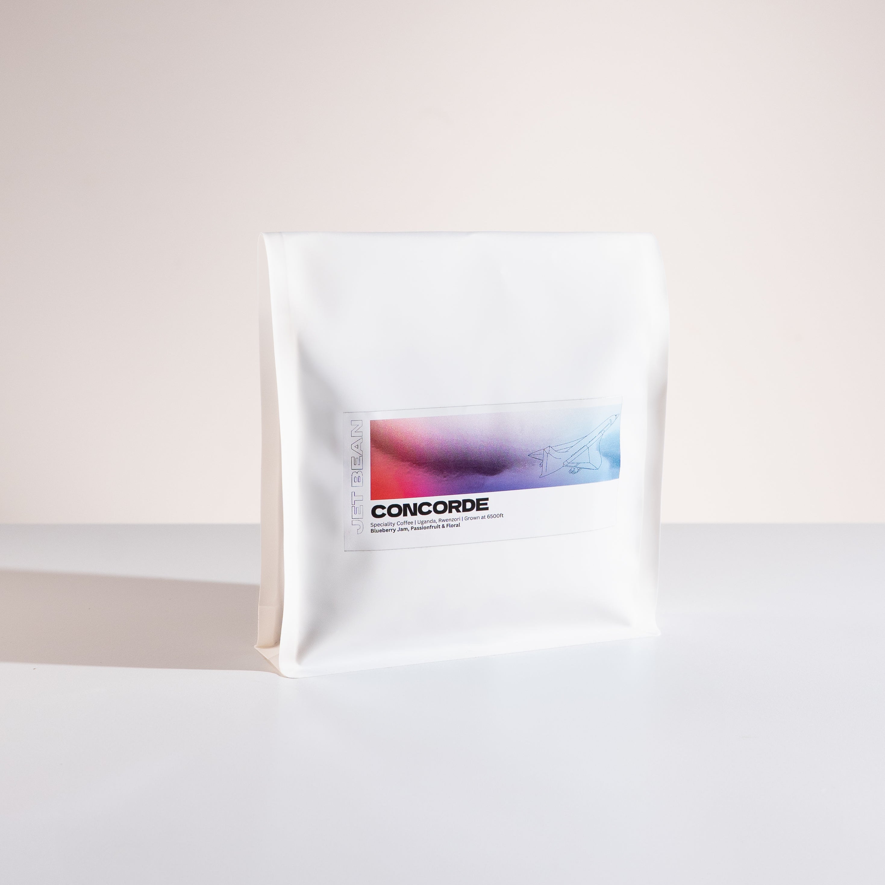 White coffee bag with 'Concorde' branding on a light background