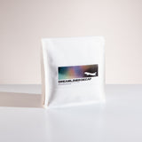 White coffee bag labeled 'Dreamliner Decaf' on a light gray background